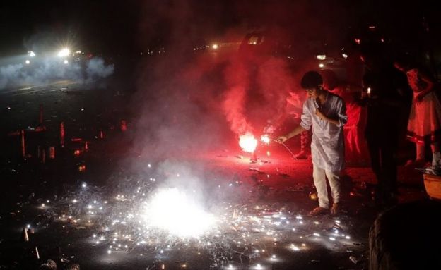 People light firecrackers during the Diwali festival celebrations near New Delhi, India, 30 October 2016.
