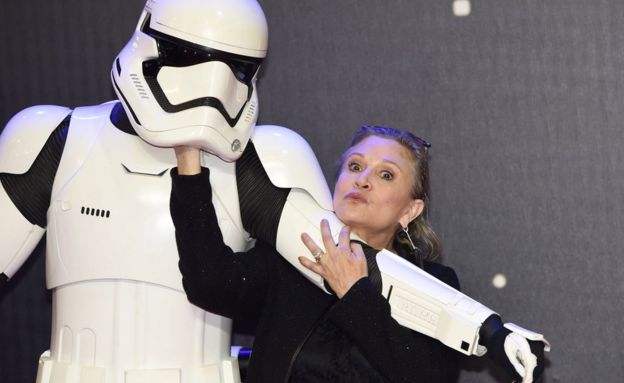 Carrie Fisher takes on a stormtrooper