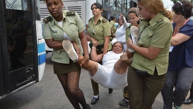 Members of dissident group 'Ladies in White', wives of former political prisoners, are detained during their protest on March 20, 2016 in Havana.