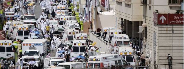 Saudi ambulances arrive with pilgrims who were injured in a stampede at an emergency hospital in Mina, near the holy city of Mecca, on the first day of Eid al-Adha on September 24, 2015.