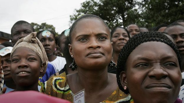 A group of women listening to a speech