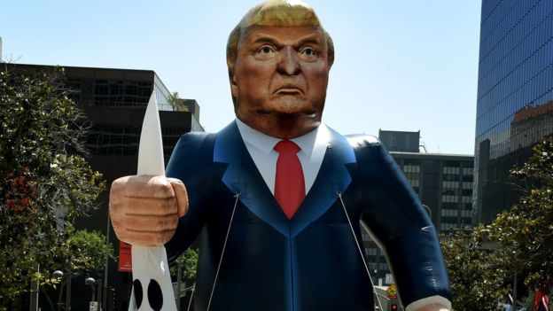 Protestors display giant effigy of Trump at demonstrations in California on 1 May 2016