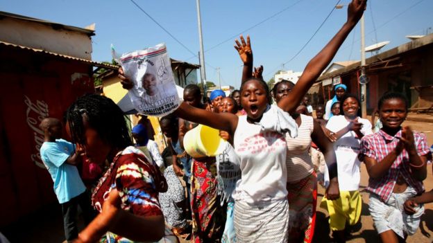 Supporters of president-elect Adama Barrow celebrate Barrow's victory