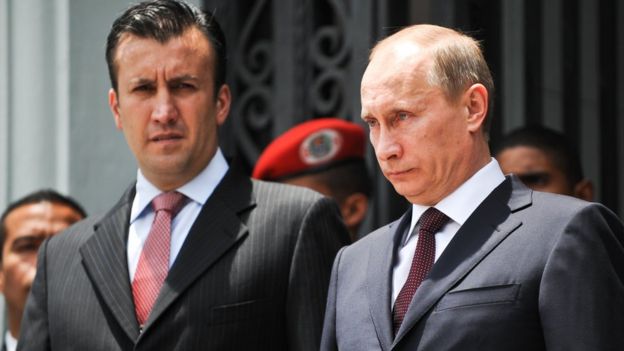 Photo taken on 2 April 2010 shows Venezuelan Interior Minister Tareck El Aissami (L) and then Russian PM Vladimir Putin
