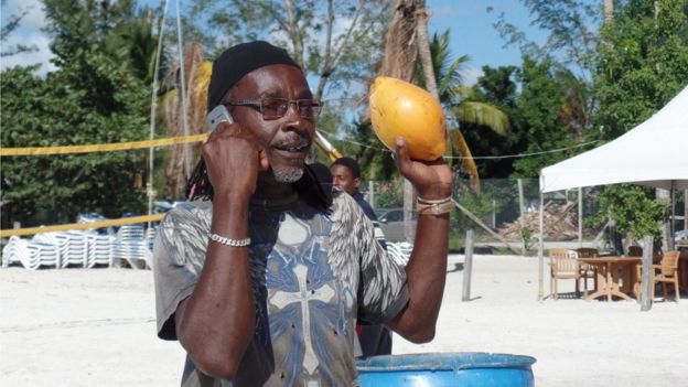 Coconut stall holder in Antigua - December 2015