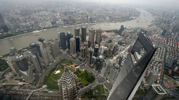 The Shanghai World Financial Centre (r)