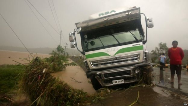 A vehicle is stuck on a roadside in the town of Piddig, Ilocos Norte province 22/08/2015