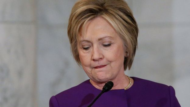 Former Secretary of State Hillary Clinton delivers remarks at a ceremony to unveil a portrait honouring retiring Senate Minority Leader Harry Reid on Capitol Hill in Washington