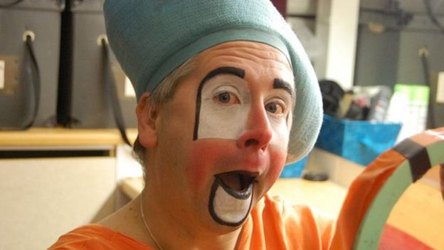 Andy the Clown puts on his make-up