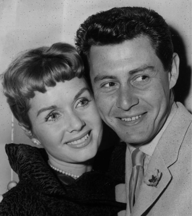 4th June 1957: American singing star Eddie Fisher and his wife, film star Debbie Reynolds at a press reception. Eddie Fisher is to appear at the London Palladium in mid-June.
