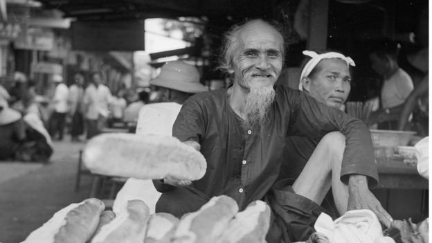 A bread seller in Saigon, circa 1956