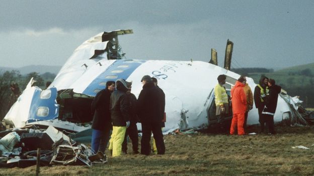 Emergency workers by wreckage of Pan Am flight 103, 1988
