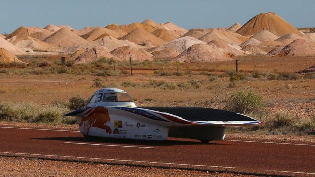 Nuna8 of Nuon Solar Team Netherlands arrive into Coober Pedy as they race on day four in the Cruiser Class of the 2015 World Solar Challenge on October 21, 2015 in Coober Pedy, Australia. Teams from across the globe are competing in the 2015 World Solar Challenge - a 3000 km solar-powered vehicle race between Darwin and Adelaide.