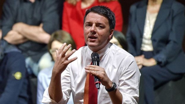 Italian Prime Minister Matteo Renzi addresses supporters during a rally