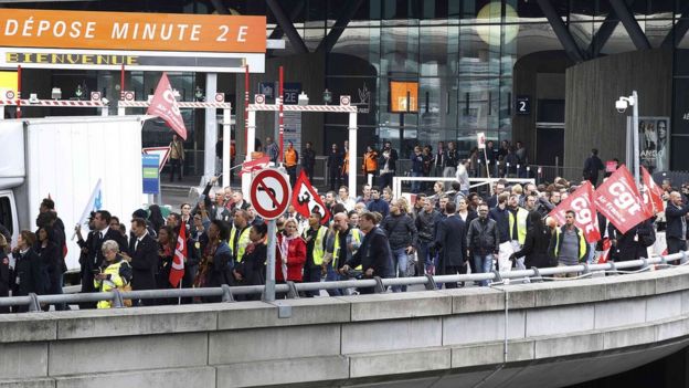 Striking Air France workers at Charles de Gaulle airport