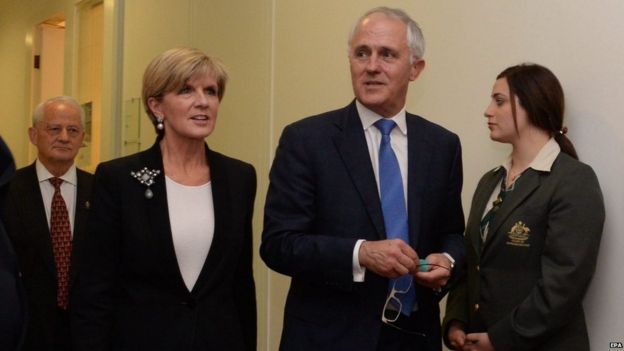 Malcolm Turnbull (C) leaves the Australian Federal Liberal party room with Julie Bishop (left) after winning the leadership, at Australian Parliament House, 14 September 2015.