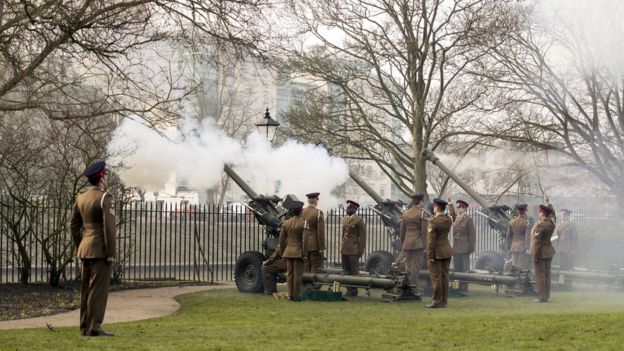 Members of the 4th Regiment Royal Artillery, fire a 21-gun salute in York's Museum Gardens
