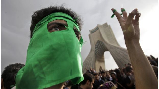 Supporter or defeated presidential candidate Mir Hossein Mousavi in front of Azadi Tower in 2009