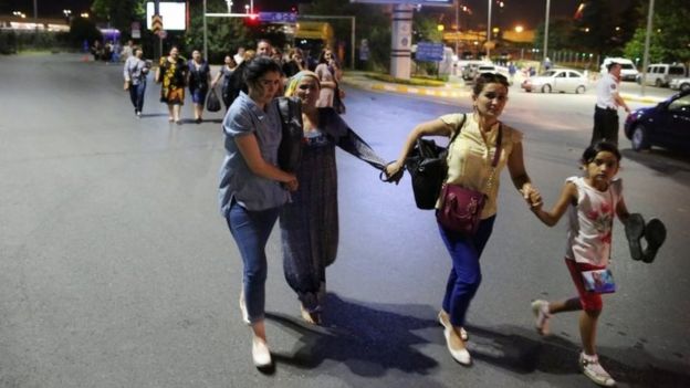 People walk away from Istanbul Ataturk airport
