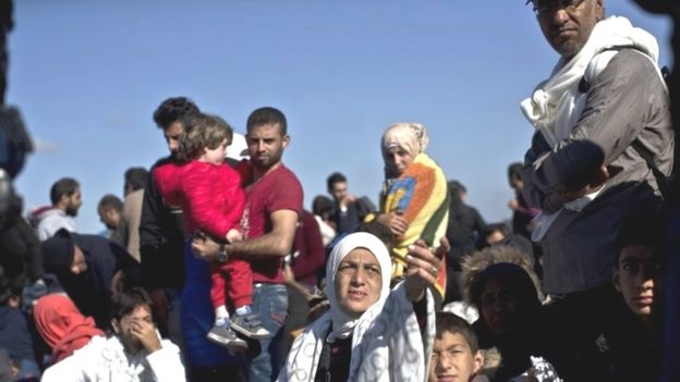 People rest at a temporary holding camp for migrants and refugees close to Hungary's border with Serbia in Roszke, Hungary (08 September 2015)