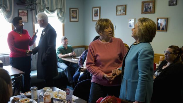 Hillary and Bill Clinton meet voters in a New Hampshire diner