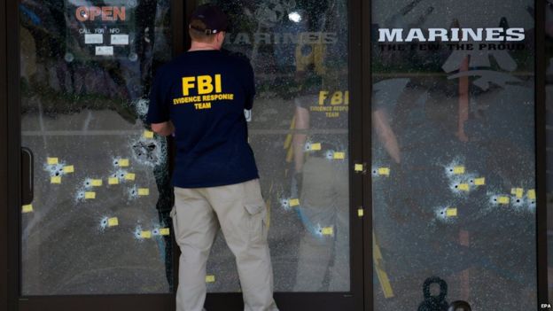 Scene of attack with bullet-riddled windows