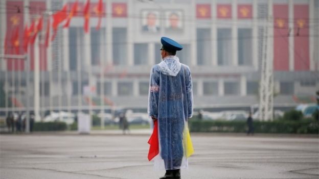 A policeman controls the traffic in front of April 25 House of Culture, the venue of Workers