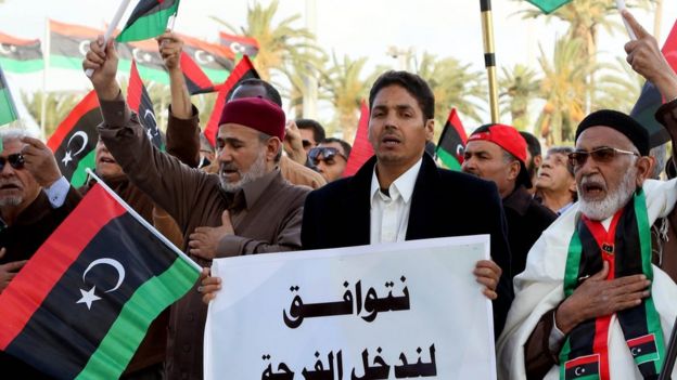 Libyans take part in a protest in Tripoli against the UN-backed unity government on 25 March 2016