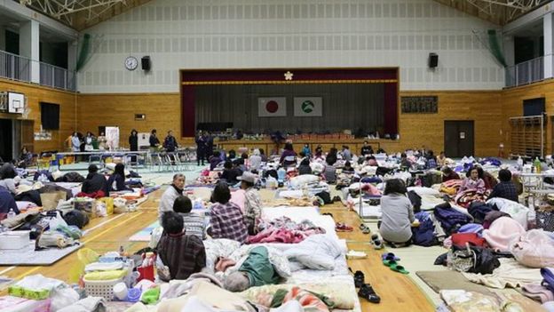 Local residents who had to evacuate their houses after the earthquake gather at Kawahara elementary school on April 17, 2016 in Nishihara, Kumamoto, Japan