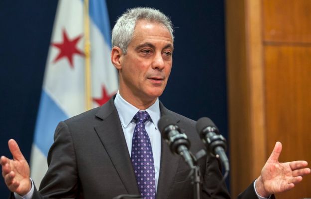 Rahm Emanuel speaking at a podium