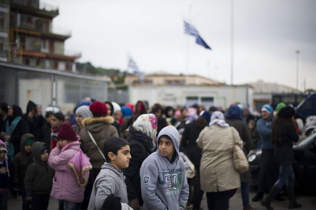 Migrants disembark at the port of Mytelene, Greece, 9 March