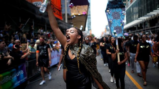 Members of Black Lives Matter Toronto take part in the annual Pride Parade in Toronto on Sunday, July 3, 2016. (Mark Blinch/The Canadian Press via AP)