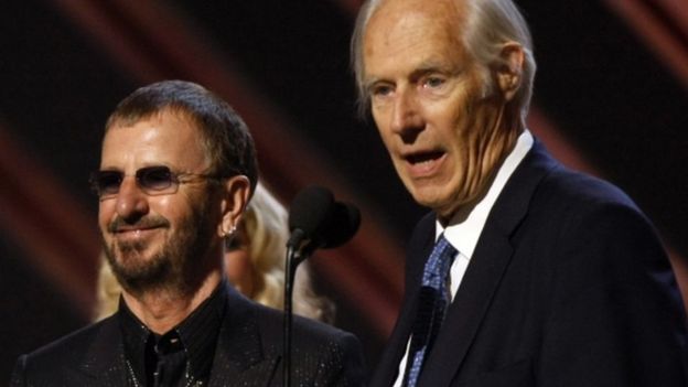 Ringo Starr and George Martin giving an acceptance speech at the Grammy awards in Los Angeles