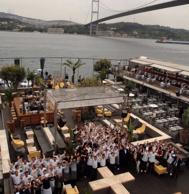 Staff of the Reina nightclub in Istanbul nightclub pose for a picture (file photo)
