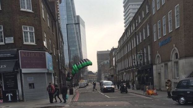 Base jumper landing on street