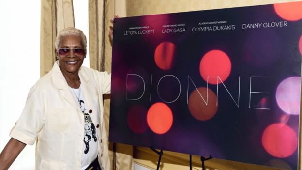 Dionne Warwick with the Dionne movie poster