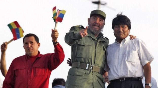 The Presidents of Venezuela, Cuba and Bolivia, Hugo Chavez (L) Fidel Castro and Evo Morales wave to supporters during a rally at the Plaza de la Revolucion in Havana, 29 April, 2006.
