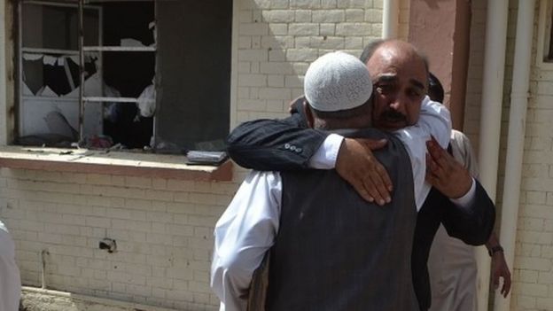 Survivors embrace after Quetta hospital blast