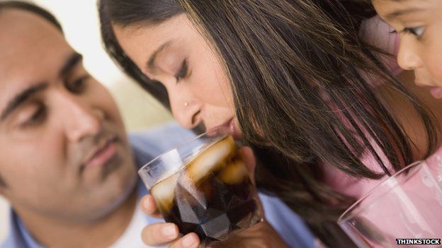 Woman drinking pop