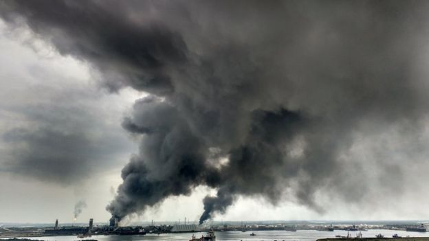 View of smoke following an explosion at the petrochemistry installation of Mexican Oil Company PEMEX in Coatzacoalcos, Veracruz state, Mexico on April 20, 2016