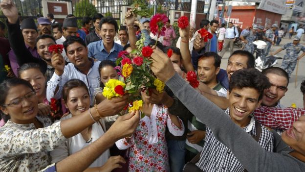 Nepalese youth cheers as they stage a flower rally to welcome the new constitution of Nepal in Kathmandu, Nepal, 17 September 2015