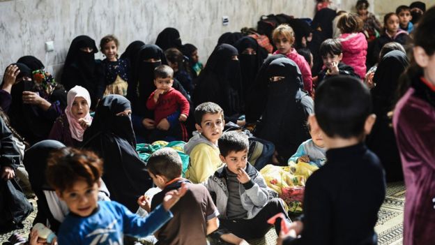 Iraqi civilians take a shelter inside the mosque, 2 November