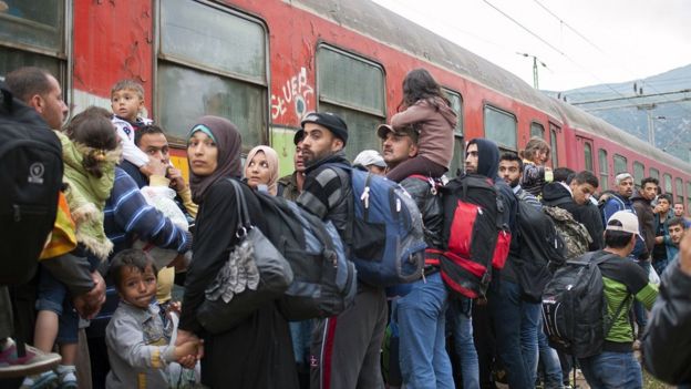 Migrants boarding train at Demir Kapija, Macedonia, 18 Jun 15