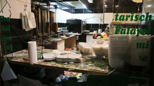 A window of a Turkish kebab restaurant is broken after a demonstration of by Legida in Leipzip, 11 January 2016