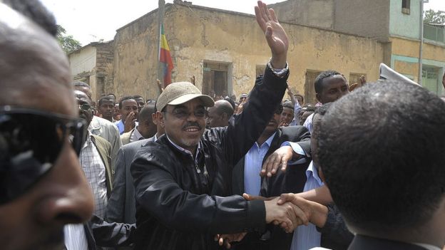 Meles Zenawi (C) greets supporters as he arrives on May 23,2010 to cast his vote at a polling station in Adwa, 900 kms north of the capital Addis Ababa.