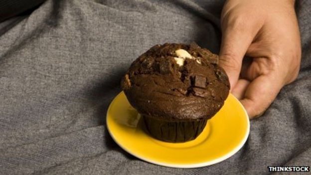 Eating a muffin in bed