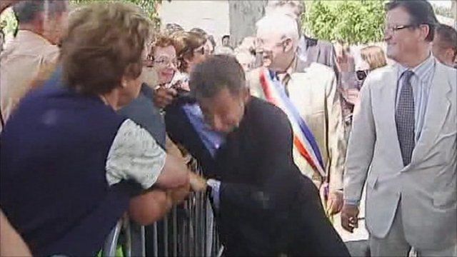 Sarkozy grabbed