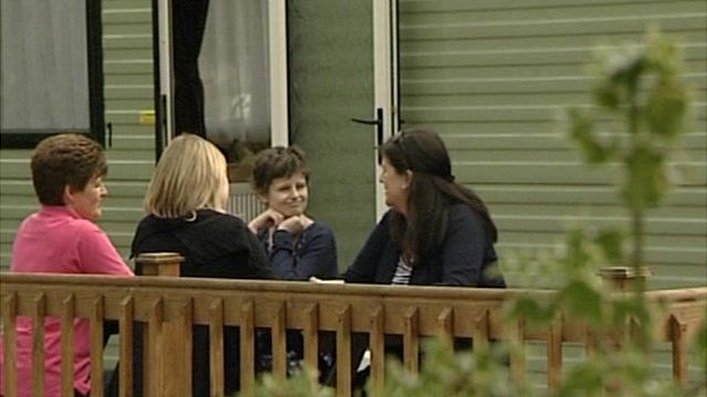 Alice Pyne with her mother and friends outside caravan