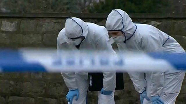 Forensic teams at crime scene