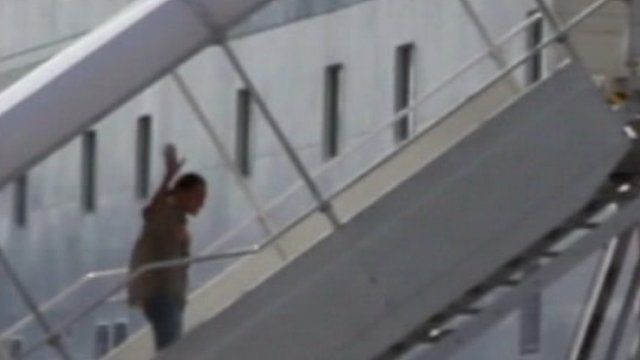 Luis Vladimir Vega boarding a ferry